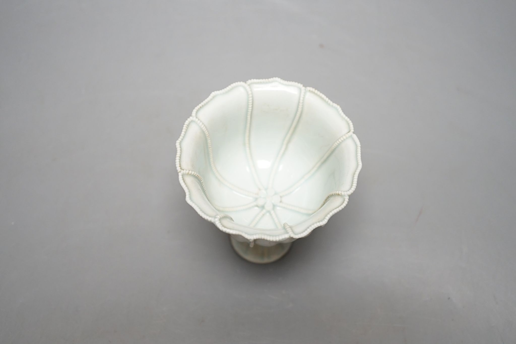 A Chinese Qingbai type stem cup., 10 cms high.